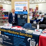 Tai Thao at the Golden Milestone Services Medicare and ACA information booth during the Milwaukee Hmong New Year celebration